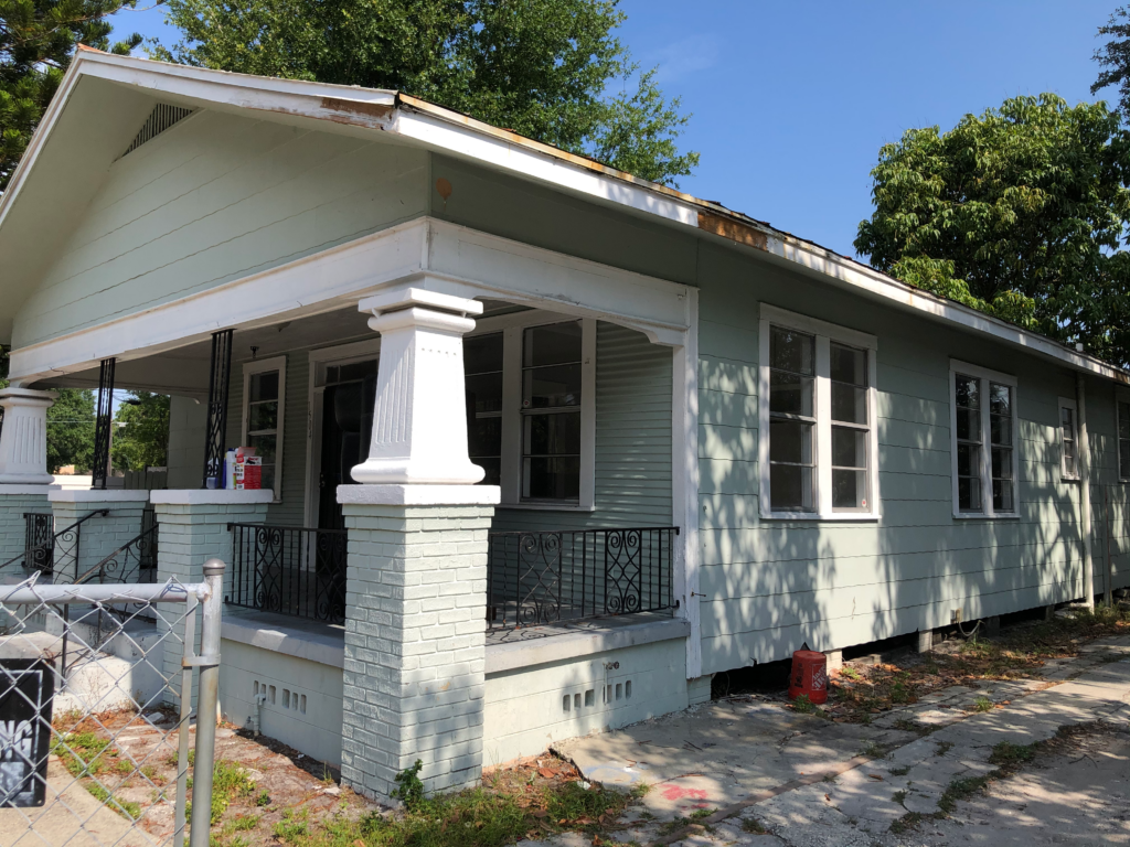 latest acquisition house front view